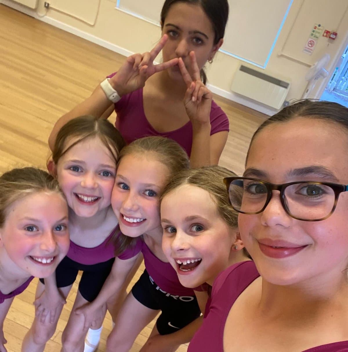 Zest Dance students taking a selfie together in the studio