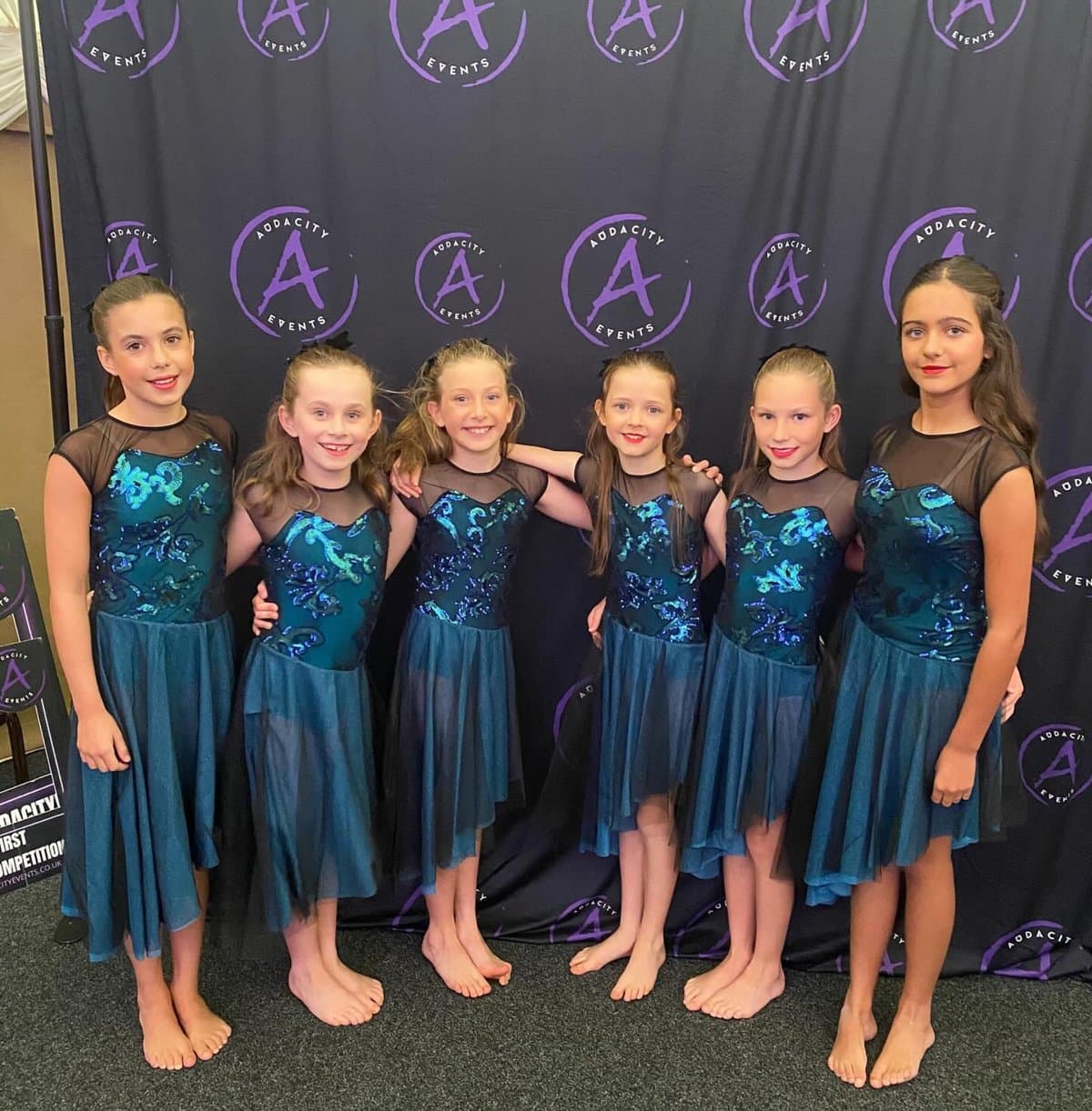 Zest Dance competition team in teal at Addacity