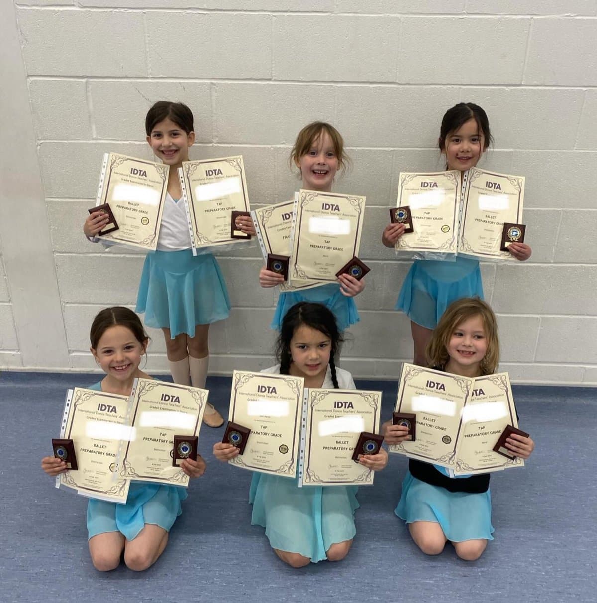 Zest Dance students celebrating IDTA exam success