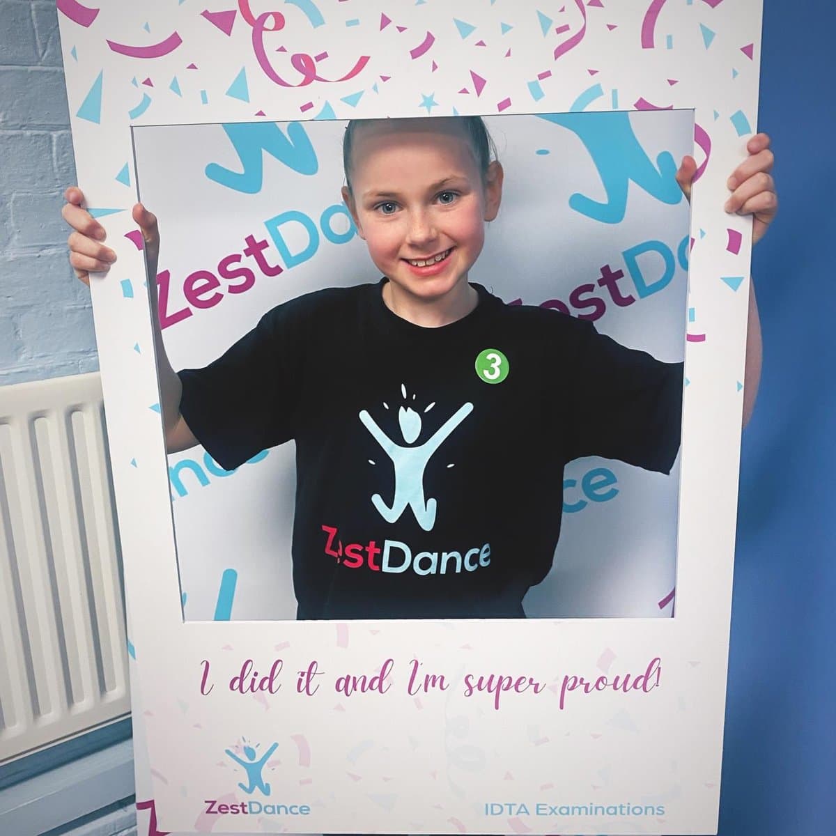 Zest Dance student celebrating IDTA exam success