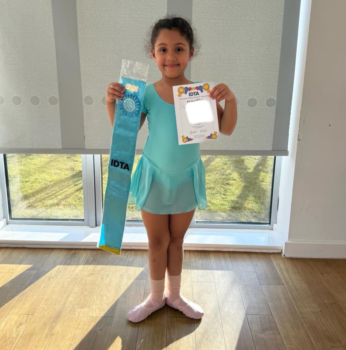 Zest Dance student with IDTA exam certificate