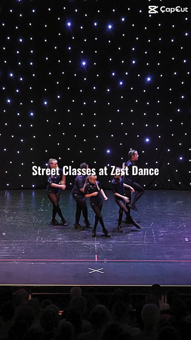 Zest Dance street dance team performing on stage