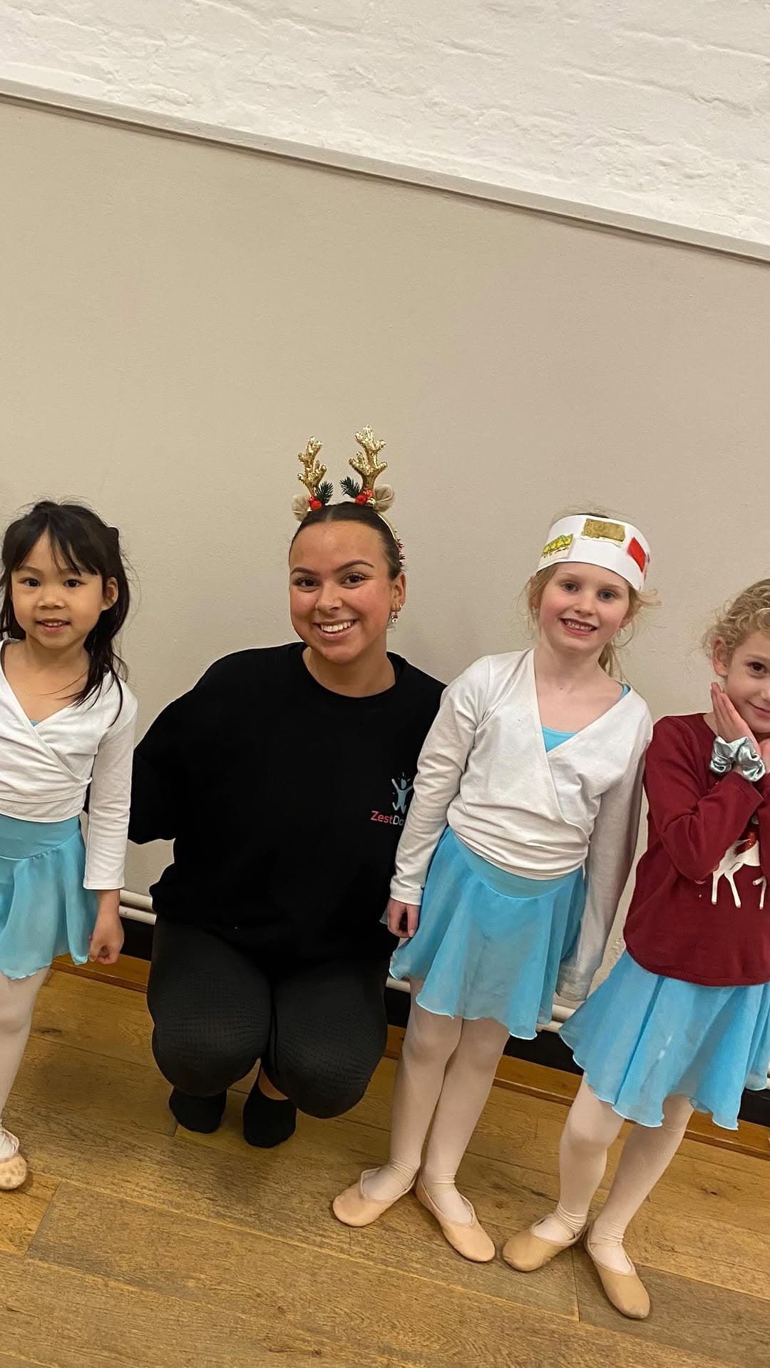 Teacher with young ballet students